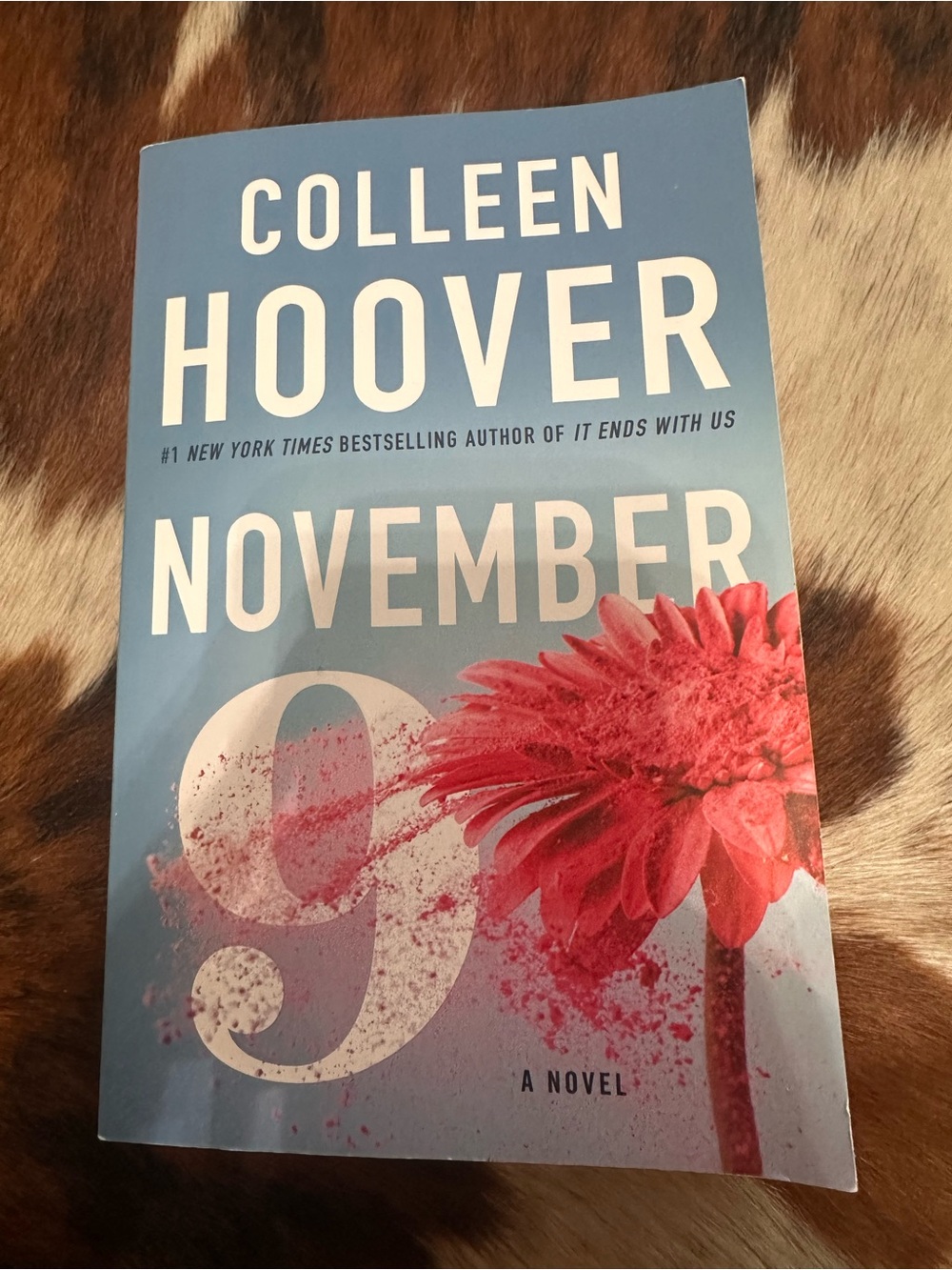 November 9 Paperback Novel - Blue with Pink Flower